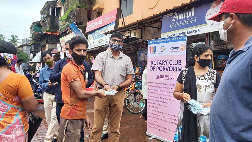 Face mask distribution at Kavlekar Supermarket